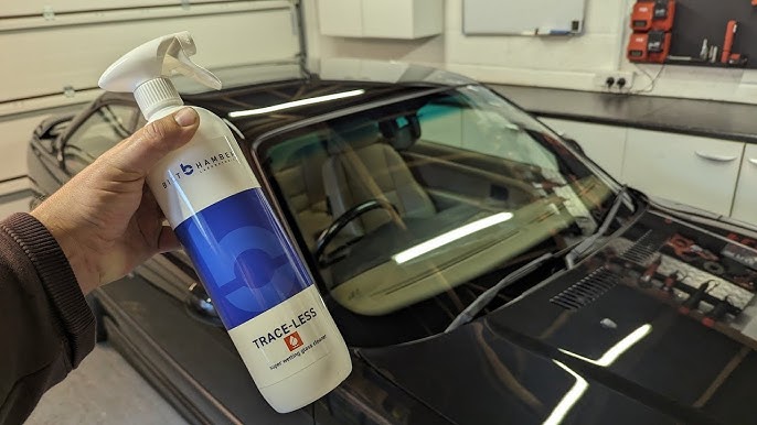 Person holding a car care product in front of a car in a garage. glass cleaner nz
car glass coating nz
water spot remover nz
windscreen water spots nz
rain repellent glass nz